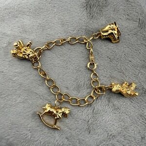 Vintage Avon Charm Bracelet Gold Tone Teddy Bear Ice Skates Doll Rocking Horse 6